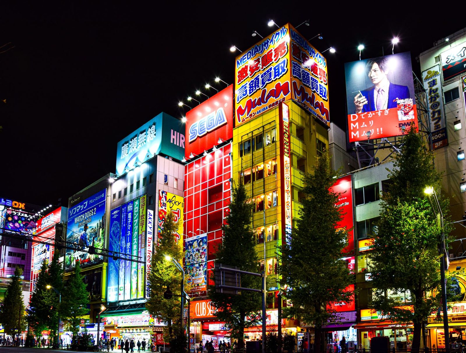 Anime-themed storefront with colorful characters and striped awning.