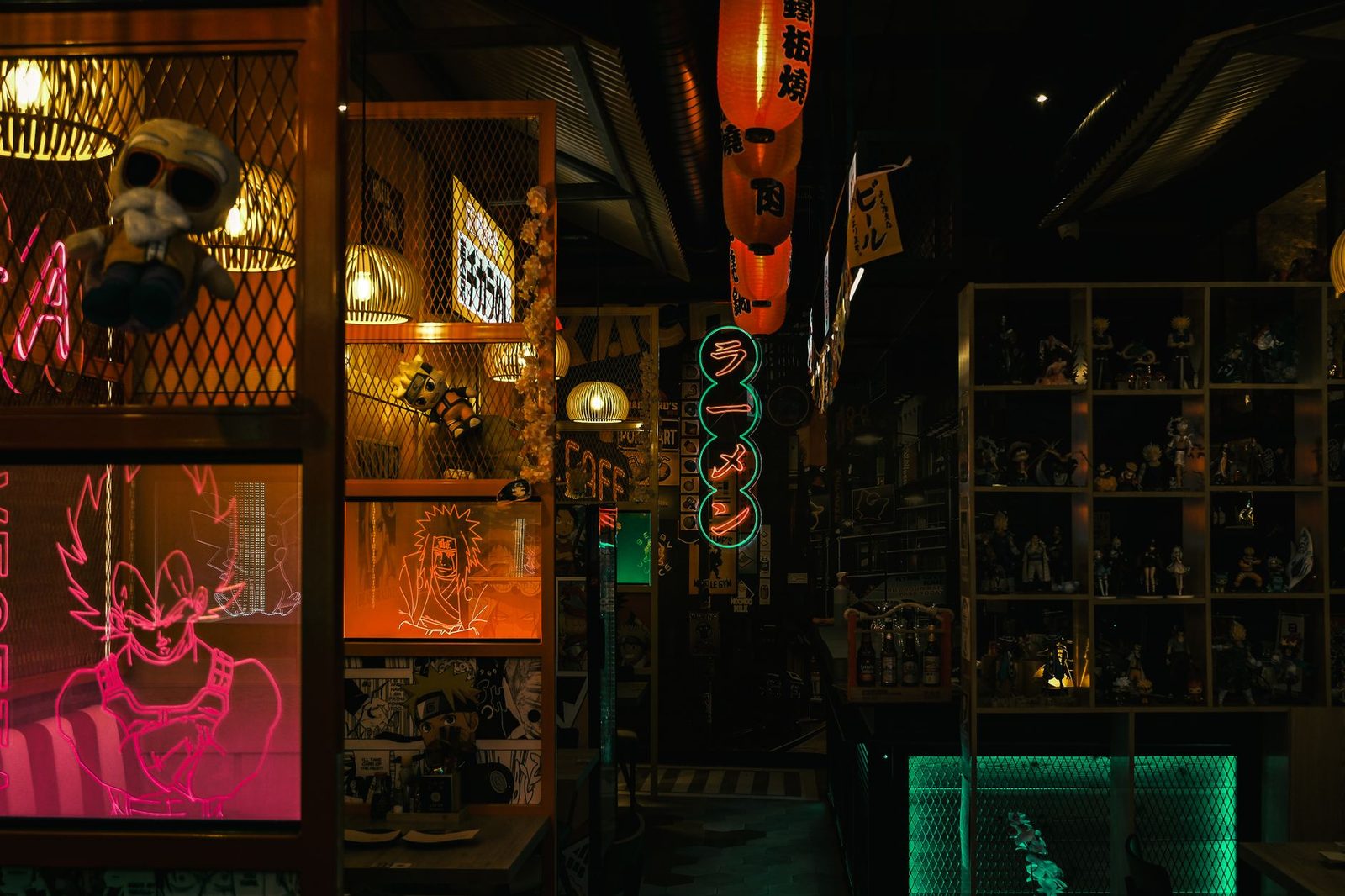 Anime-themed storefront with colorful characters and striped awning.