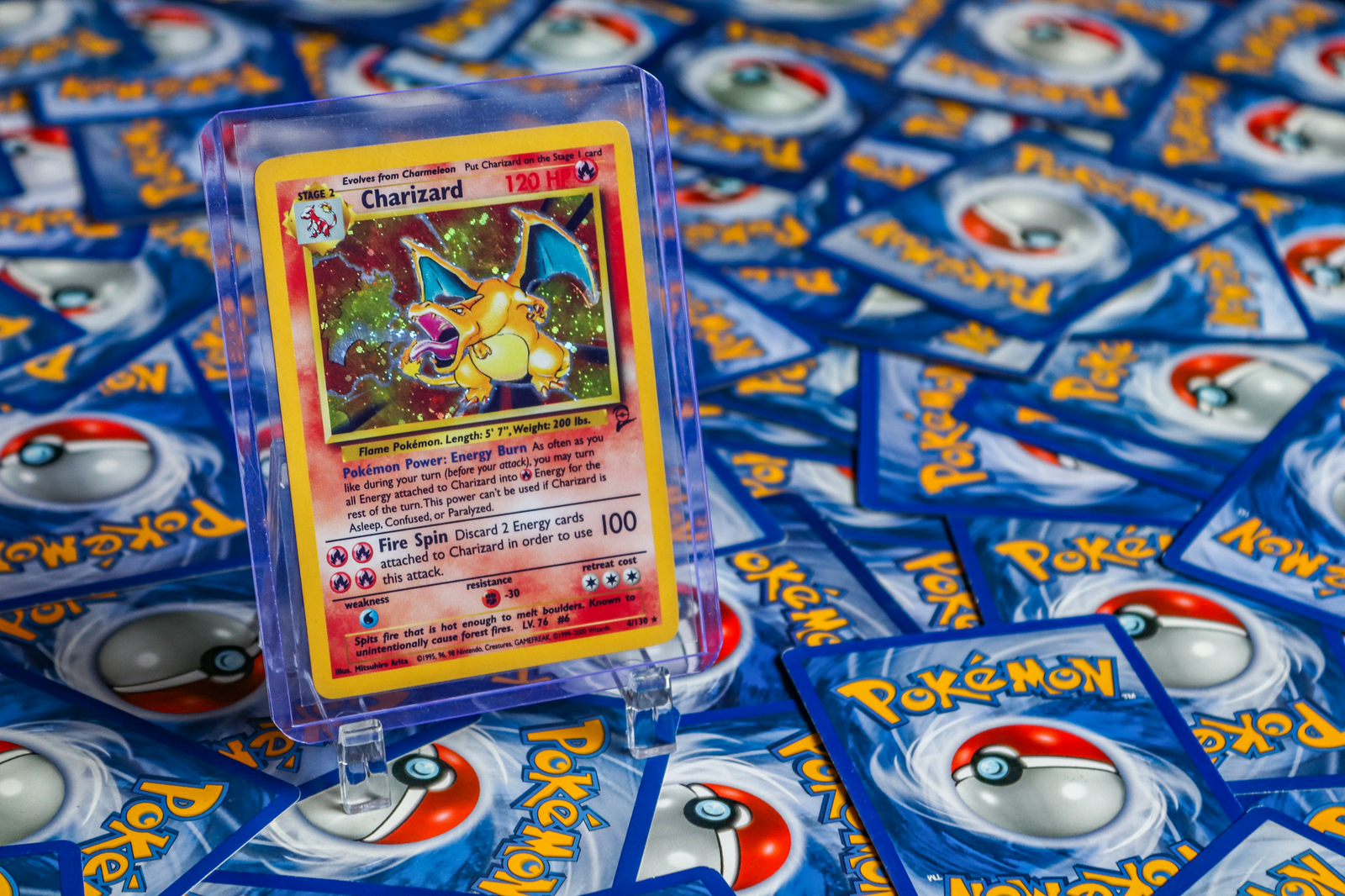 A close-up view of Yu-Gi-Oh! trading cards in a display case showcasing rare and collectible cards.